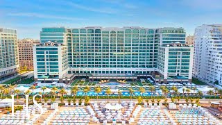 HILTON Dubai Palm Jumeirah Hotel  BEACHFRONT Resort full tour 4K [upl. by Ayama]