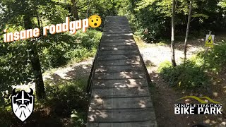 First time at single track bikepark huge roadgap on the slopeduro😯 [upl. by Nnylhsa]