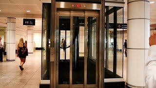 Epic Priceless amp Amazing inground hydraulic glass elevators  Montreal Trudeau Airport YUL [upl. by Adnical949]