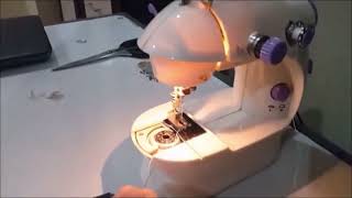 How to Thread a Needle in Portable Mini Sewing Machine [upl. by Adilem]