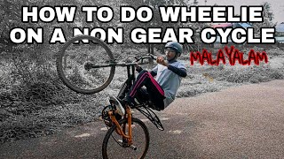 HOW TO DO WHEELIE ON A NON GEAR CYCLE IN MALAYALAM [upl. by Sorvats]