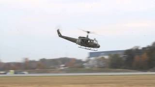 Huey low pass flyby Warbirds over Monroe 2014 [upl. by Eniawed]