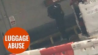 Airport workers fired after footage emerged of them lobbing passengers suitcases [upl. by Yenots]