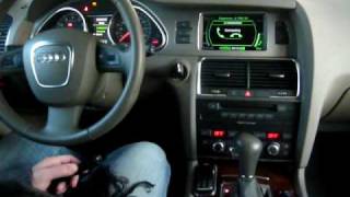 Audi Q7 MOST Bluetooth Car Kit and NavNGo Limousine on MMI Monitor [upl. by Eninaej452]